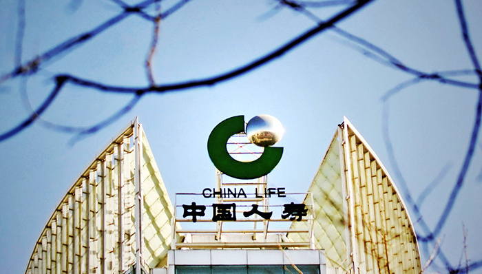 中国人寿2014年财报,中国人寿2014年利润大涨,中国人寿保费增速放缓,股市大涨带动中国人寿业绩