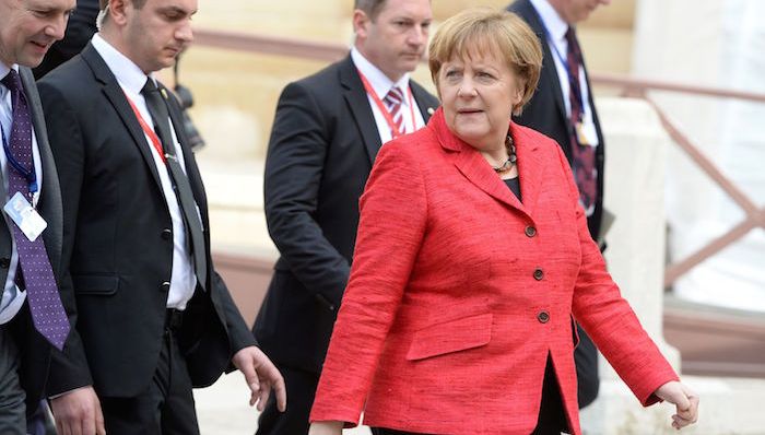 默克尔,汇率机制