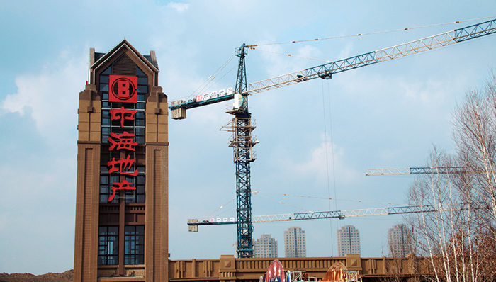 中海地产2014业绩喜人,中海地产完成母公司资产注入,业界看好中海地产前景,中建系地产业务完成整合