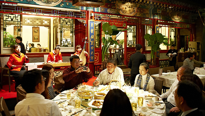 光明集团与良友集团合并,国企重组