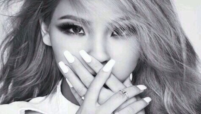 仅次普京的韩国歌手CL  征战美国后会面的两名男子是谁？