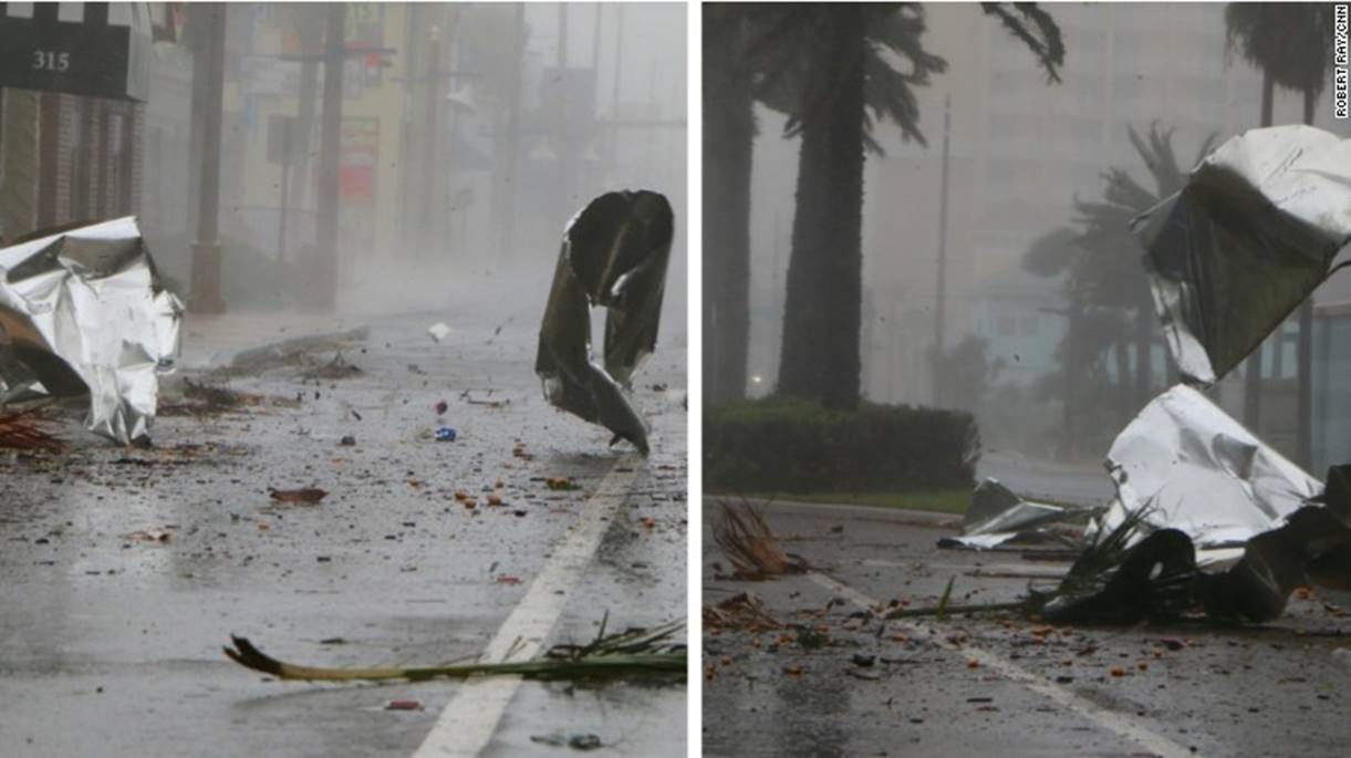 Debris flies through the streets of Daytona Beach. 