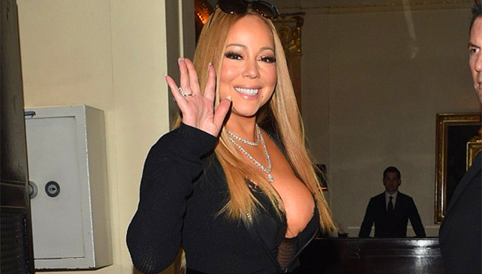 玛利亚·凯莉穿低胸裙大秀事业线 携小鲜肉男伴伦敦出游