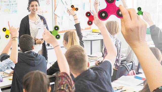 专治各种小烦躁的掌上玩具在美国火了起来