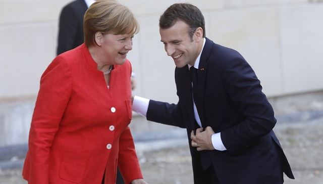 马克龙之后默克尔旋风式访美 向特朗普施压钢铝关税