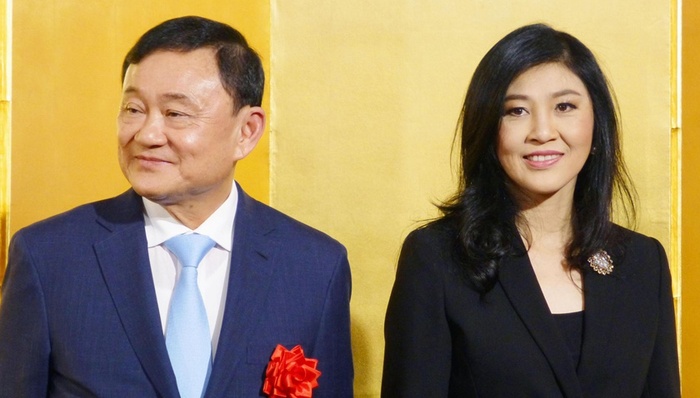 英拉,他信,泰国,英国,美国