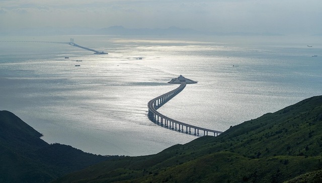 专家建议粤港澳大湾区善用两制之利 先行先试减税降负