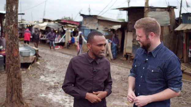 伊德里斯·阿布迪（左）