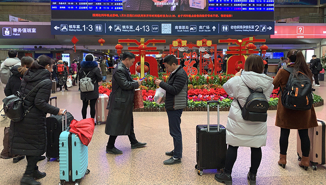 【春节特供·特写】踏上回家的列车