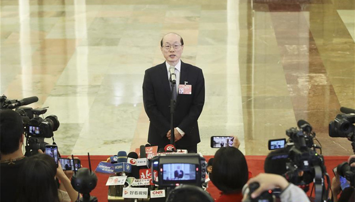 国台办主任：祖国统一的大势滚滚向前，任何人阻挡不了