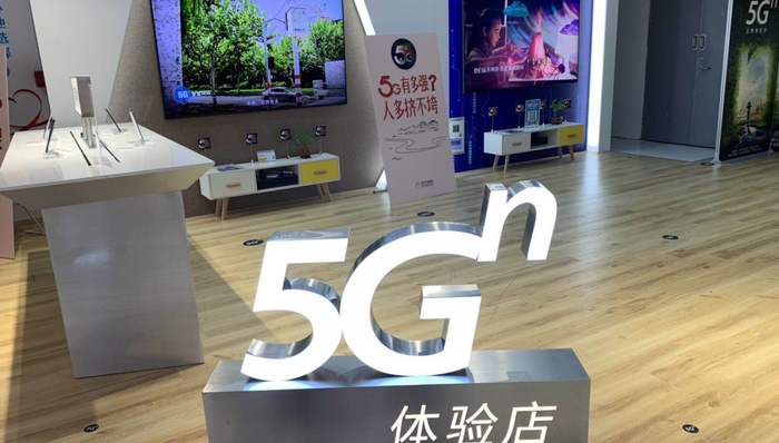 我们体验了首家5G店面，10秒就能下载好《王者荣耀》