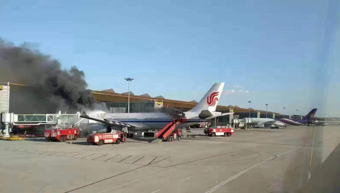 快看 | 国航一客机货舱登机前冒烟，所有旅客安全撤离