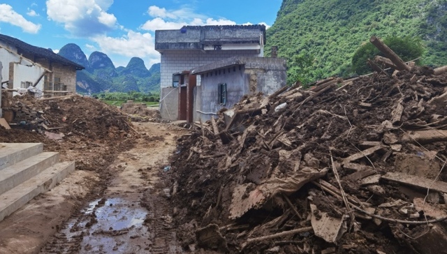 【特写】南方汛期中的广西小镇：暴雨、溢洪与重建