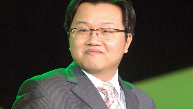 新科“白衣骑士”许世坛并购上瘾