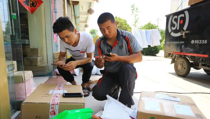 【深度】每天一亿个包裹，“快递进村”有多难？