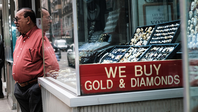 【图集】金价飙升，现货黄金突破2000美元大关