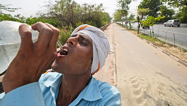 【图集】极端高温席卷印度等地，热浪正在考验“人类生存极限”
