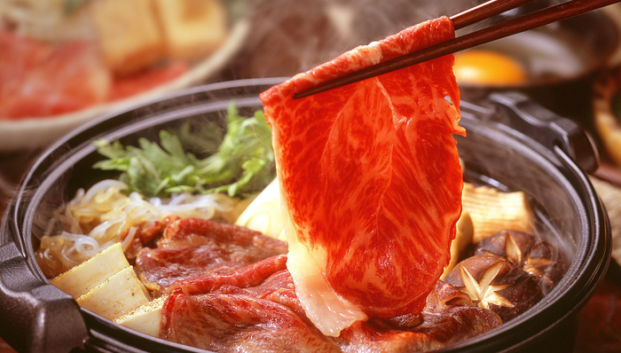 这家手绘财报封面的香港餐饮公司是谁？