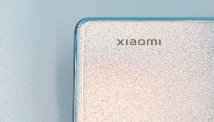 高端市场,雷军,智能手机,造车,