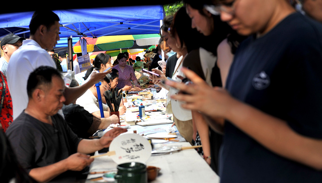 After the feast - Zibo's BBQ flame sputters but still burns