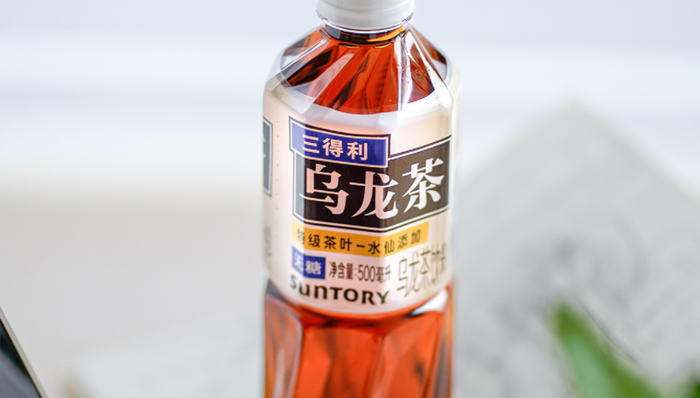 东方树叶,三得利,茶饮料,促销,市场竞争,健康,消费习惯,