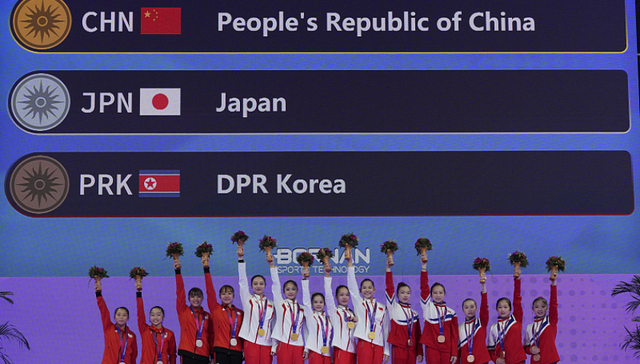 中国女子体操队成功卫冕，实现亚运13连冠壮举