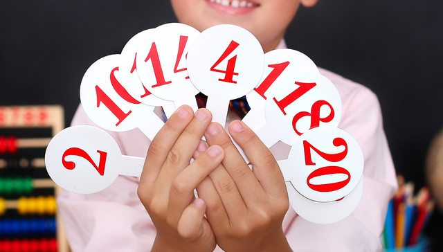 “掼蛋”该不该进校园？