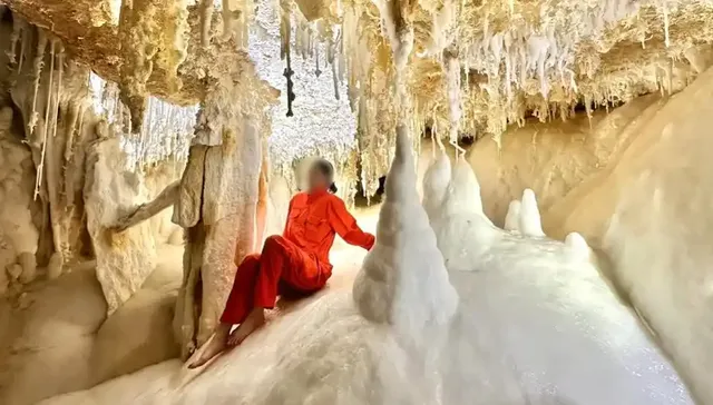 女子赤脚踏入4.8亿年晶花池拍照，当地回应：系招商考察获准入内，目前洞穴已封闭