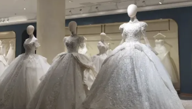 “抠门”的新人，急坏了婚纱城的老板们