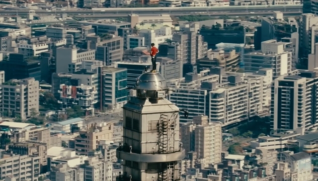 被观看与被消费的风险美学：徒手登顶台北101之后