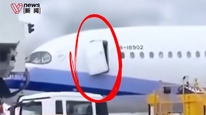 中华航空一客机与廊桥碰撞机舱门被扯歪