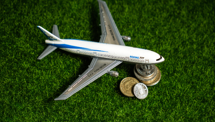 油价翻倍，廉航“瘦身”：谁在劝退五一出境游？