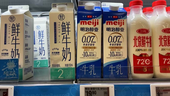 乳制品明治中国;高端策略;失灵