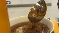 活力中国调研行｜开街7个月！机器人大厨炒菜、煮面、做煎饼，这个AI街区“智”感十足