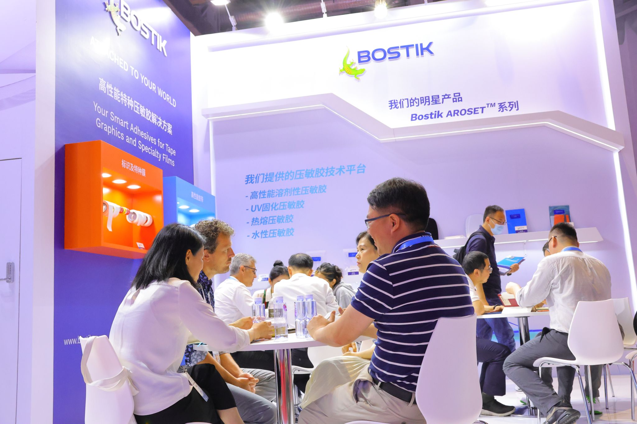 A group of people sitting at a tableDescription automatically generated