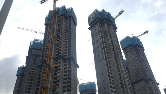 龙华金茂府逐步封顶 现房入市能否打破“地王困局”？