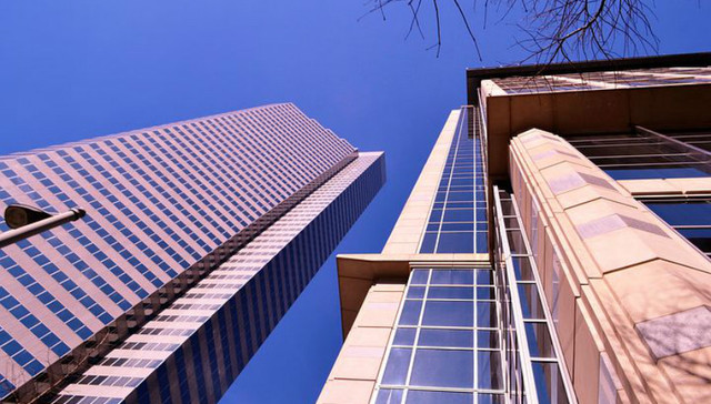 下行周期的房企生存术： 卖地求生与兼并扩张并存