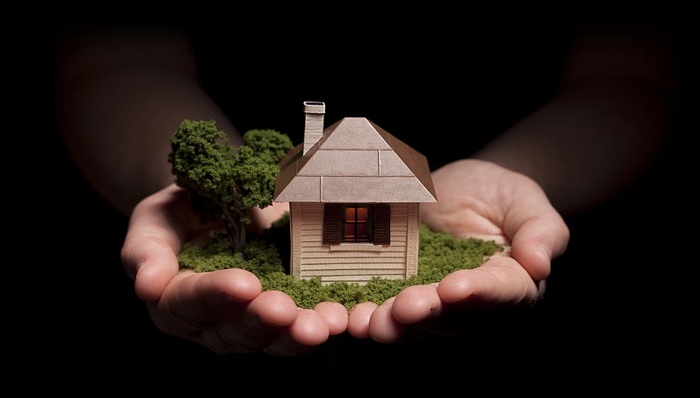 楼市现“托底式”维稳：部分城市限制降价