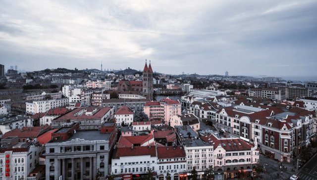 时评 | 两处青岛百年地标重生，老城产业格局如何重塑？