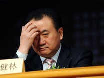 王健林差点被赶下“牌桌”
