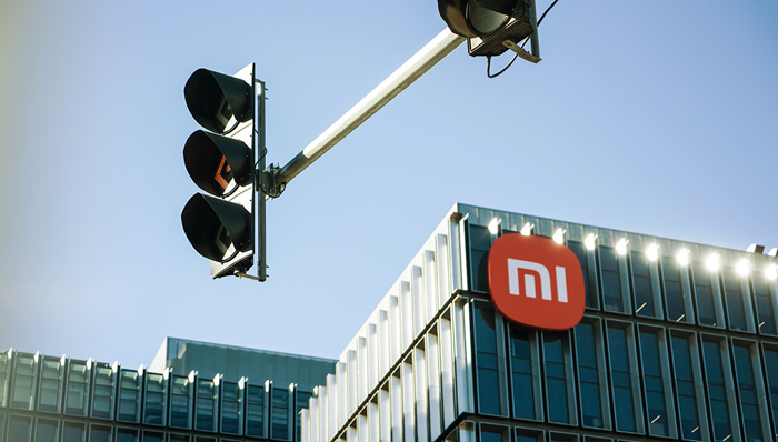 小米汽车业务;去年收入;首超千亿;首次扭亏为盈